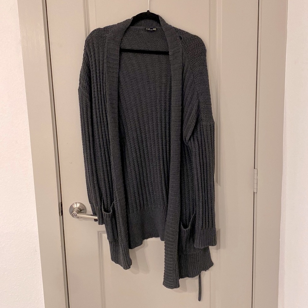 Sweater/cardigan. Navy blue..